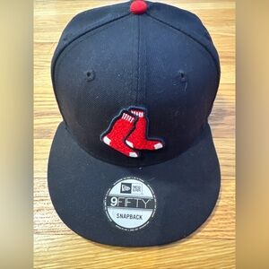 New Era Genuine Merchandise Cap with Red and Blue Accents